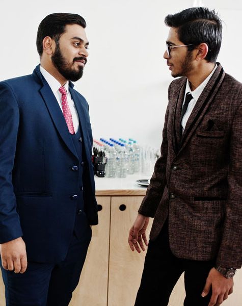 two-indian-businessman-suits-standing-cafe-discuss-each-other